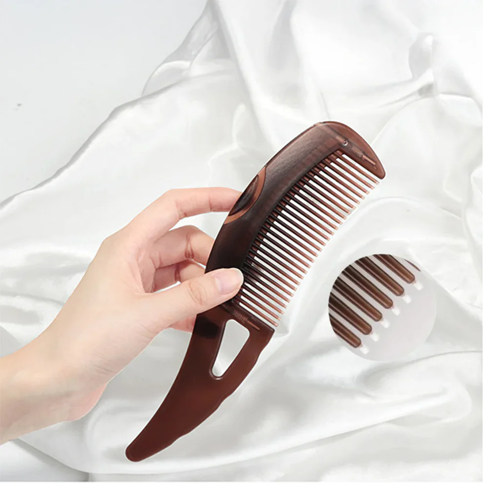 EXFOLICOMB⢠ā Scalp Detox Comb